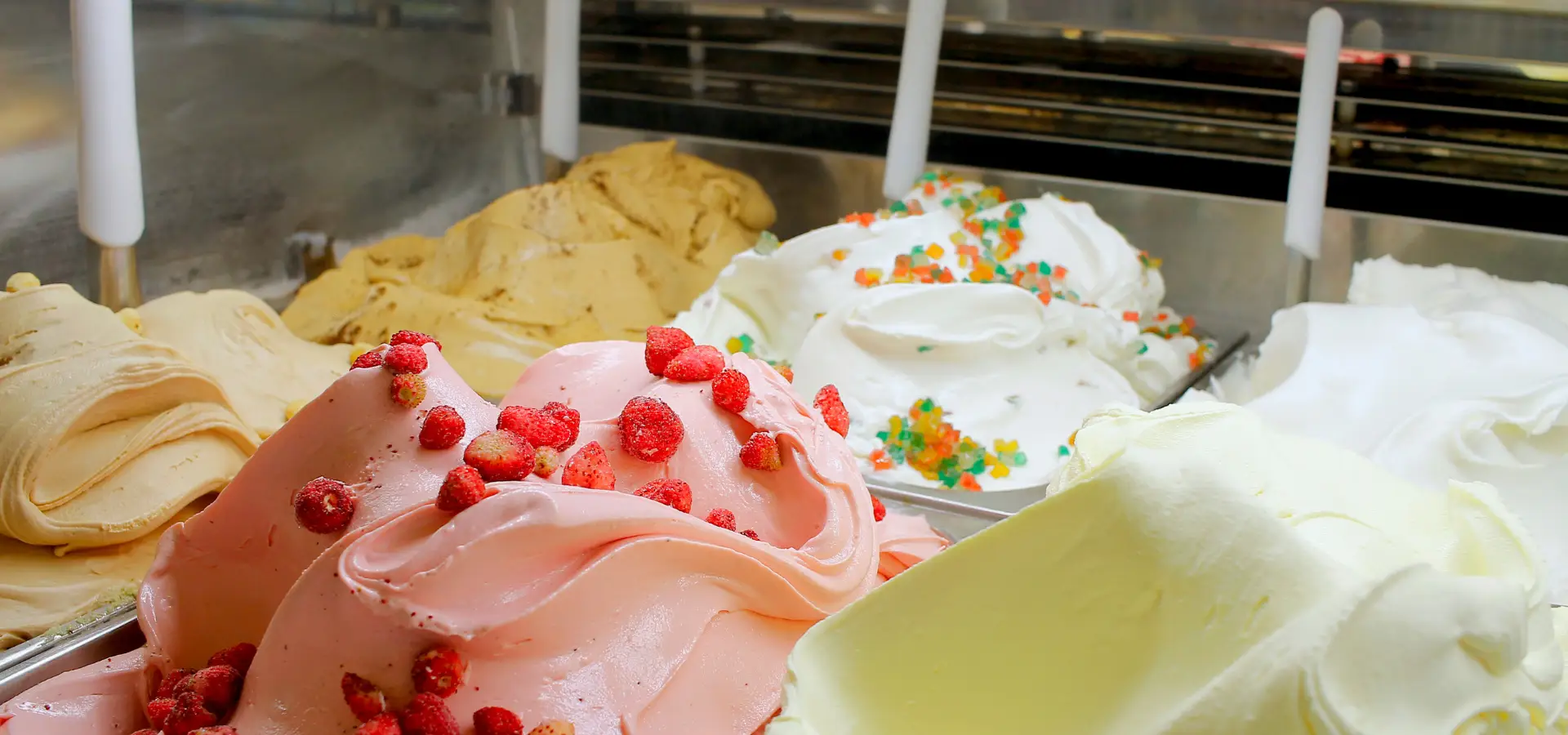 Indulge in the artisanal charm of our in-house crafted gelato, a scoop of pure delight